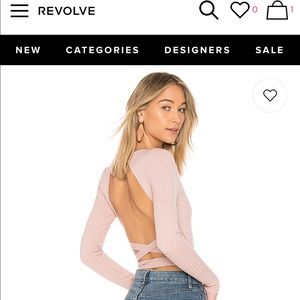 Blush open back long sleeved bodysuit from revolve